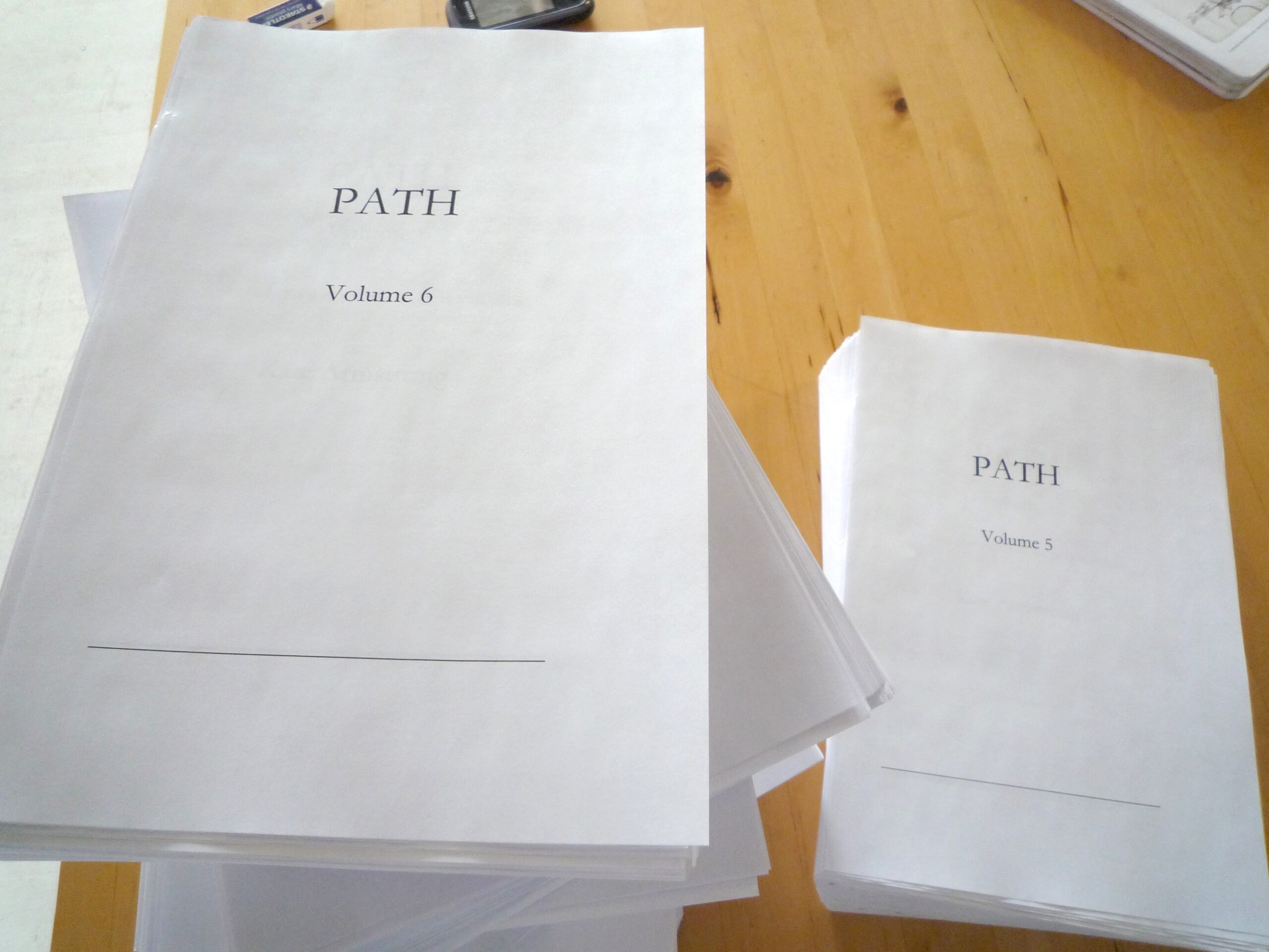 copies of Path waiting to be bound at Publication Studio Vancouver