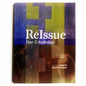 A purple, green, and brown publication with a glossy cover, with white text that reads: ReIssue Year 2 Anthology, Guest Edited by Julia Prudhomme
